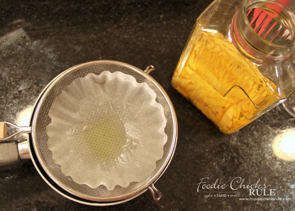Homemade Limoncello - Easier than you think! - strain it - #limoncello foodiechicksrule.com