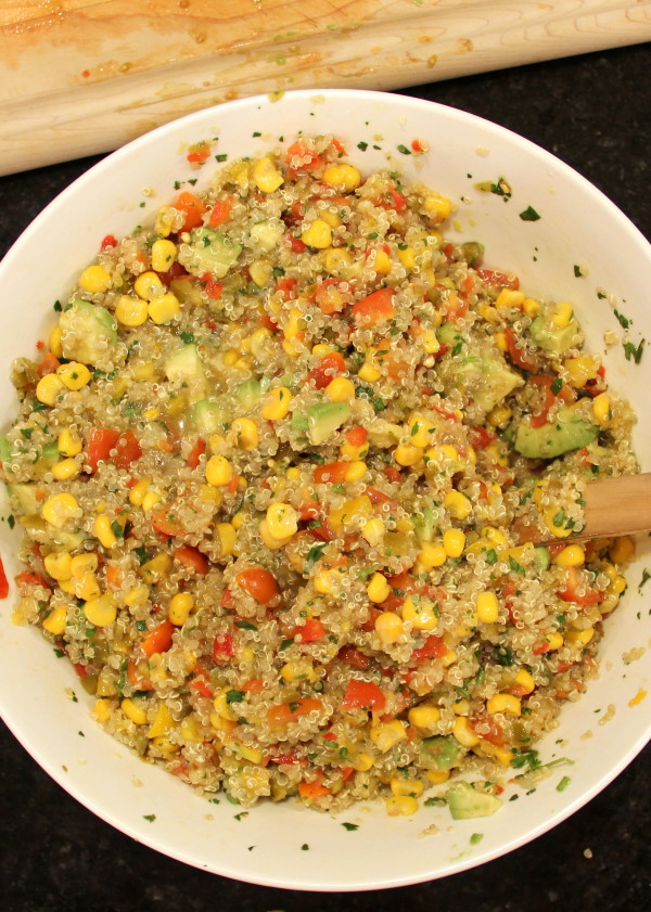 Avocado, Corn & Quinoa Salsa - SO delicious - #avocado #quinoa #salsa foodiechicksrule.com