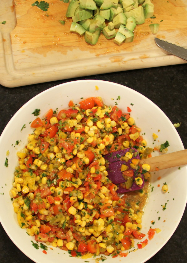 Avocado, Corn & Quinoa Salsa - mix ingredients together - #avocado #quinoa #salsa foodiechicksrule.com