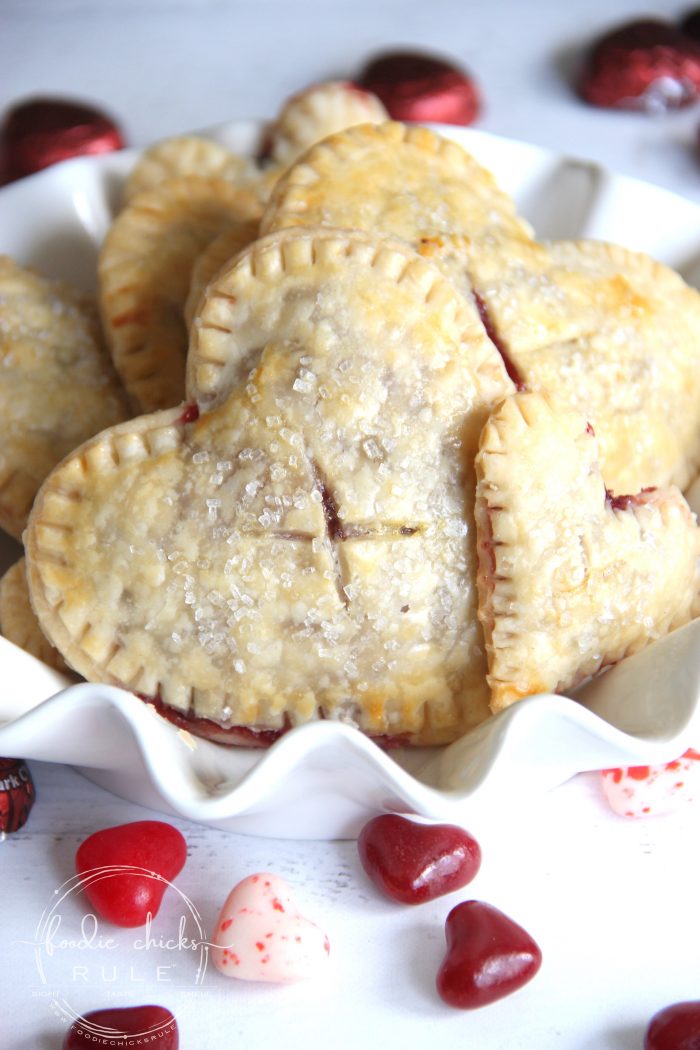 Chocolate Raspberry Mini Heart Pies ... Perfect for Valentine's Day! (or any day! ;) ) foodiechicksrule.com #valentinesdaydesserts #chocolateraspberry #miniheartpies #heartshapeddesserts #easydesserts #valentinesdesserts 