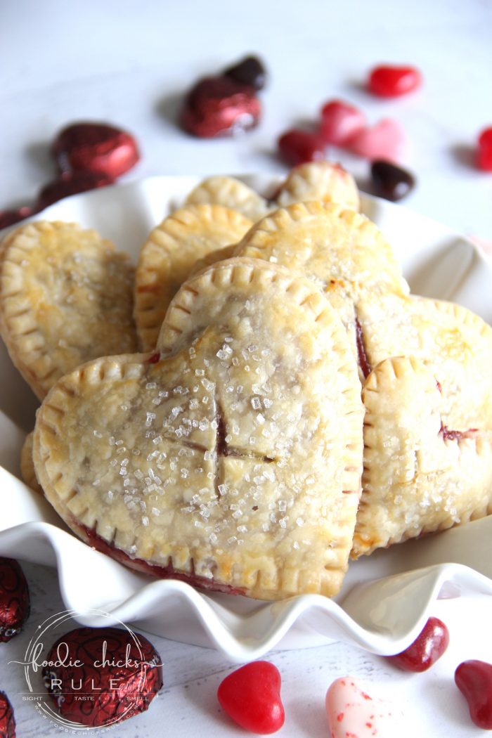 Chocolate Raspberry Mini Heart Pies ... Perfect for Valentine's Day! (or any day! ;) ) foodiechicksrule.com #valentinesdaydesserts #chocolateraspberry #miniheartpies #heartshapeddesserts #easydesserts #valentinesdesserts 
