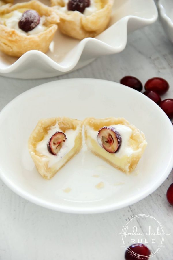 Delicious, festive and adorable SUGARED CRANBERRY CUSTARD TARTS are the perfect dessert to bring to your next holiday gathering, simple to make too! artsychicksrule.com #cranberrydesserts #sugaredcranberry #cranberrycustard #custardtarts #holidaydesserts