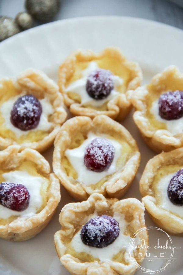 Delicious, festive and adorable SUGARED CRANBERRY CUSTARD TARTS are the perfect dessert to bring to your next holiday gathering, simple to make too! artsychicksrule.com #cranberrydesserts #sugaredcranberry #cranberrycustard #custardtarts #holidaydesserts