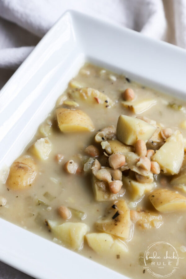 This Hearty Potato and Bean Soup is a sure winner every time! Keep it chunky or blend it for a creamy alternative! Very versatile while always delicious! foodiechicksrule.com #potatosoup #beansoup #vegansoupideas #potatoandbeansoup #plantbasedsoups